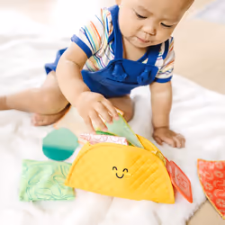 Melissa & Doug Multi-Sensory Soft Taco Fill & Spill Infant Toy