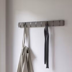 Umbra 8 Flip Wall Mounted Floating Rack â Modern, Sleek, Space-Saving Hanger with Retractable Hooks to Hang Coats, Scarves, Purses and More,