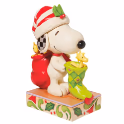 Enesco Peanuts by Jim Shore Snoopy with Woodstocks and a Stocking Figurine  7 Inch  Multicolor