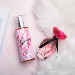 GUESS Girl Eau de Toilette 3 Piece Gift Set - Perfume Spray 3.4 Fl. Oz.  Travel Spray 0.5 Fl. Oz.  & Body Lotion 6.7 Fl. Oz.