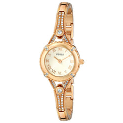 GUESS Petite Vintage Inspired Gold-Tone Crystal Bracelet Watch with Self-Adjustable Links. Color: Gold-Tone (Model: U0135L2)