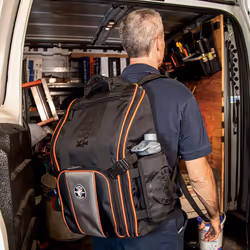 KLEIN TOOLS 55655 Tool Bag Backpack  Tradesman Pro Tool Station with 21 Pockets and Large Interior  Includes Flashlight with Work Light