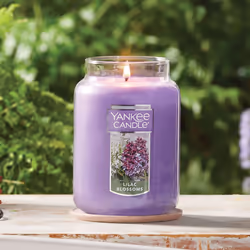 Yankee Candle Lilac Blossoms Scented  Classic 22oz Large Jar Single Wick Candle  Over 110 Hours of Burn Time  Perfect for Gifting  Gatherings and Seas