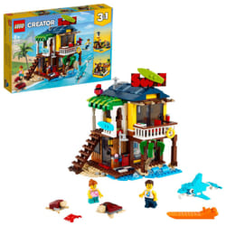 LEGO Creator 3 in 1 Surfer Beach House with 2 Minifigures and Dolphin Figure  Transforms from Surf Shack to Lighthouse to Pool House  Great Building T