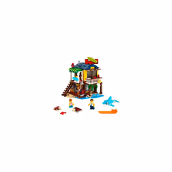 LEGO Creator 3 in 1 Surfer Beach House with 2 Minifigures and Dolphin Figure  Transforms from Surf Shack to Lighthouse to Pool House  Great Building T
