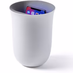 Oblio. a beautiful place to sanitize and charge your smartphone. A wireless charging station designed with a vase shape that ...