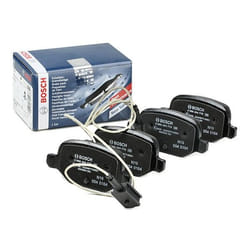BOSCH 0 986 494 779 Brake pad set Low-Metallic with integrated wear sensor with anti-squeak plate FIAT: 500 Hatchback, Panda II Hatchback