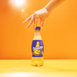 Orangina Sparkling Orange Drink - 12 x 420ml Bottles - Orange Flavour Juice Drink with Real Orange Pulp - Made with Sugar and Sweeteners - No Added