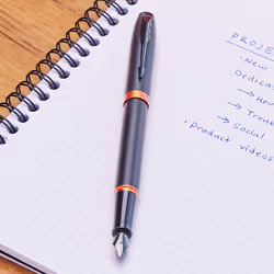 Parker IM Vibrant Rings Fountain Pen | Satin Black Lacquer with Flame Orange Accents | Fine Point with Blue Ink Refill | Gift Box
