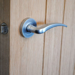 VIBE Design Corsica Lever on Rose Door Handle - Satin Chrome