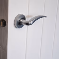 VIBE Design Corsica Lever on Rose Door Handle - Satin Chrome