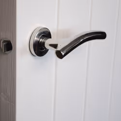 ViBE Kurva Stainless Steel Lever on Rose Handle - Polished Stainless Steel