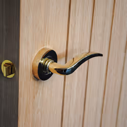 VIBE Design Corsica Lever on Rose Door Handle - Polished Brass