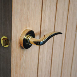 VIBE Design Corsica Lever on Rose Door Handle - Polished Brass