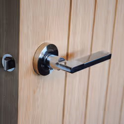 ViBE Naxos Lever on Rose Door Handle in a Dual Finish