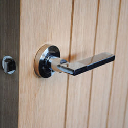 ViBE Naxos Lever on Rose Door Handle in a Dual Finish