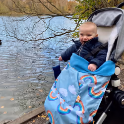 BundleBean - GO Multi-use Waterproof Footmuff Rainbow - Use as Pushchair  Carrier  Sling  Car Seat Cover  Opens as Playmat  Universal Fit & Extends to
