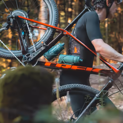 Elite Cannibal XC Bio-Based Bottle Cage  Black Glossy with Blue Graphic - Lightweight and Secure for All Terrains
