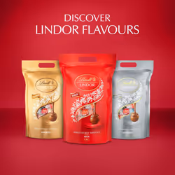 Lindt Lindor Milk Chocolate Truffles Bag - Approx 80 balls, 1kg - Chocolate Truffles with a Smooth Melting Filling - Gift Present or Sharing Box